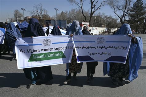 Afghan women rally at Taliban approved protest