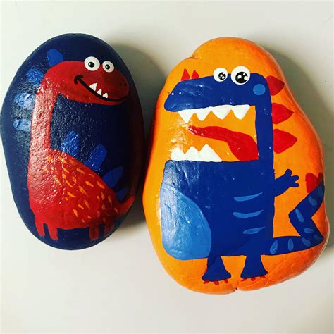 Dinosaurs! Dinosaur painted rocks! | Turtle painted rocks, Painted rocks, Stone art painting