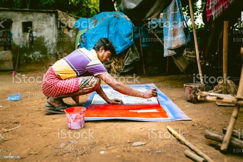 An Indian Artist Preparing Red Backdrop For Navratri Festival Stock ...