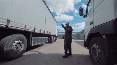 The Warehouse Worker Showing To Driver To Stock Footage SBV-313891350 - Storyblocks