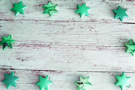 Photo of Green Christmas star border on rustic wood | Free christmas images