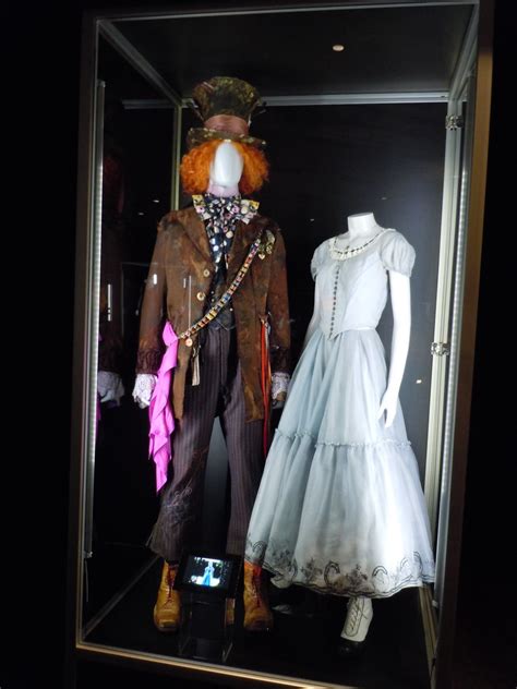 Hollywood Movie Costumes and Props: Mad Hatter and Alice in Wonderland costumes on display ...