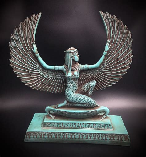 Egyptian Goddess statue of Motherhood Isis sitting on a boat and ...