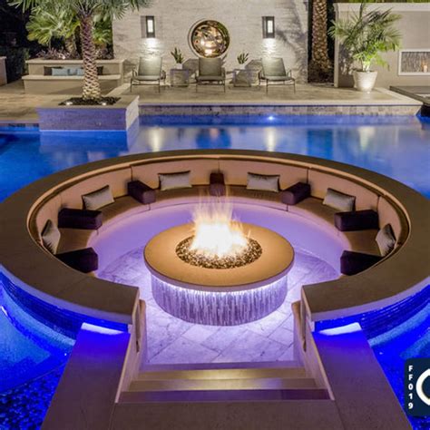 Pools with Fire Bowls: Heat Up Your Pool Design With 22 Ideas