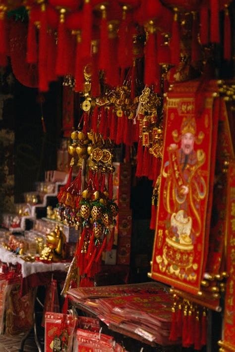 Assorted Gold and Red Chinese Lucky Charms on Display · Free Stock Photo