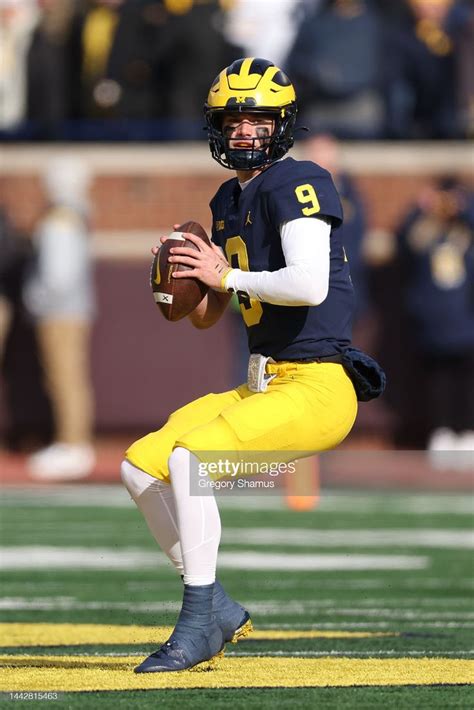 J.J. McCarthy of the Michigan Wolverines throws a first half pass... | Michigan wolverines ...