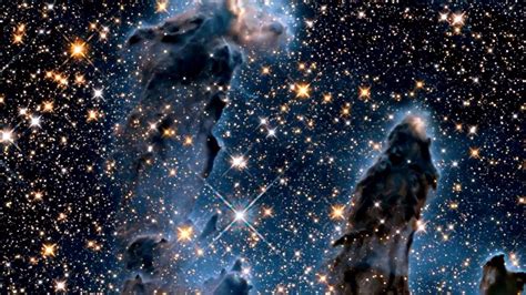 Eagle Nebula Exposed in New Hubble Infrared View | Video - YouTube