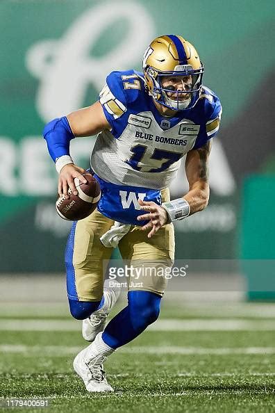 Chris Streveler of the Winnipeg Blue Bombers runs with the ball in ...