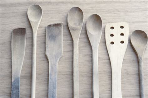 Toned grey neutral set of wooden kitchen utensils - Free Stock Image