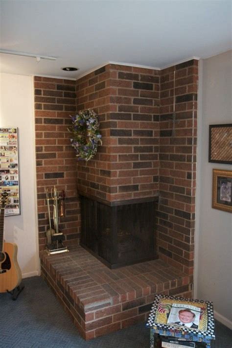 brick corner fireplace | Fireplace remodel, Freestanding fireplace, Corner fireplace