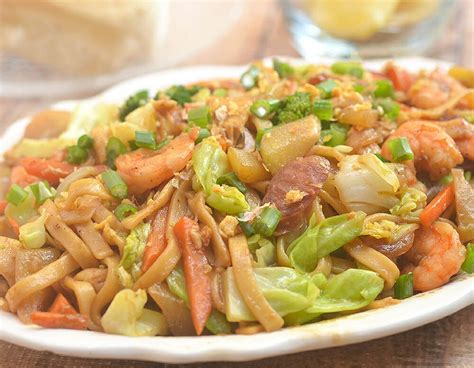 Pancit Lomi is a quick and easy noodle stir-fry perfect for snack or ...