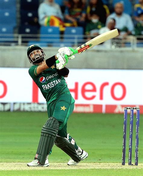 :Dubai:Pakistan's Mohammad Rizwan plays a shot during the T20 cricket match.