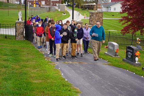 PHOTOS: Mary’s Home students visit Our Lady of the Snows Cemetery | The Catholic Missourian