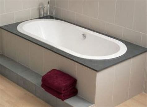 The DECINA UNO 1700 should look something like this - inset bath...stone top? Tapware in middle ...