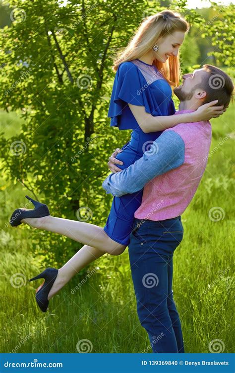 Boy and Girl in Hugging, Couple of Lovers Happy in the Park on a Sunny Day Stock Photo - Image ...