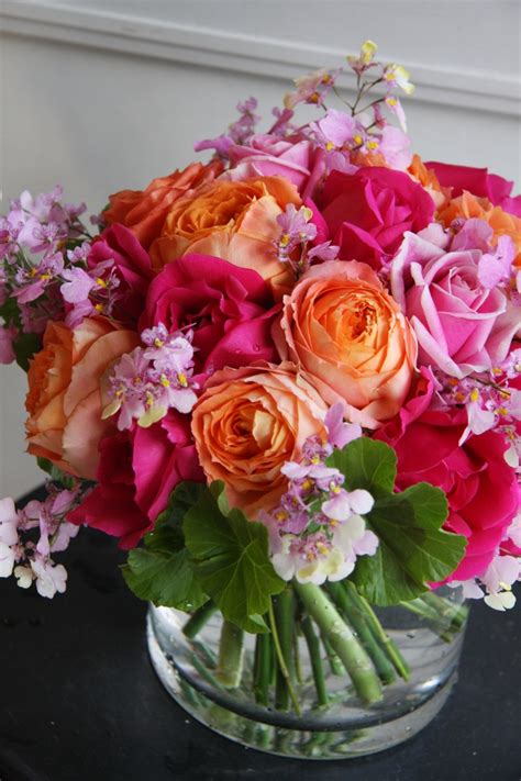 vivid pink+orange roses | Tropical flower arrangements, Flower ...