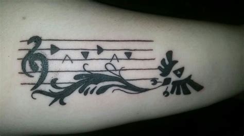 First tattoo, My new Legend of Zelda tattoo, Song of time. | Zelda ...