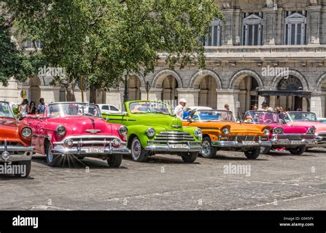 Havana Cuba Habana central colorful old classic 1950's cars on display near Capital for rental ...