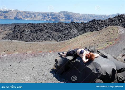 Tour of the Caldera of the Santorini Volcano Editorial Stock Image - Image of boulders, volcanic ...