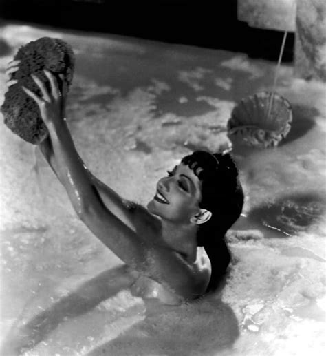 Claudette Colbert in a bath of milk, during the filming of 'The Sign of ...