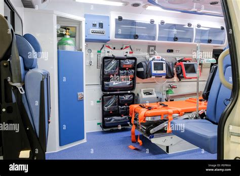 Inside an ambulance car with medical equipment for helping patients before delivery to the ...