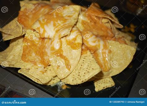 Nachos with cheddar cheese stock image. Image of nachos - 120289793