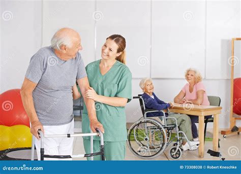 Old Man with Geratric Nurse in Nursing Home Stock Photo - Image of everyday, rehab: 73308038