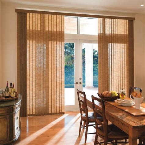 I love the light brown color of these custom vertical blinds. My husband and I are redecorating ...