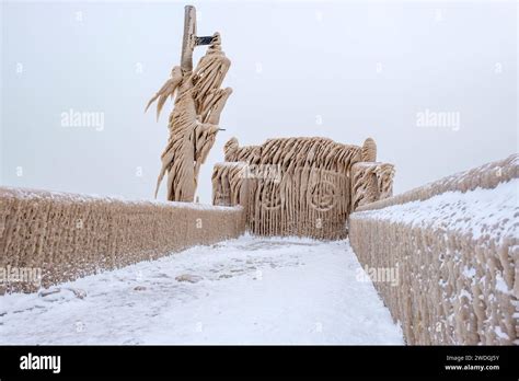 Winter wonderland, gates of Port Stanley pier covered by icicles from ...