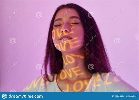 Conception of Love. Beautiful Young Woman is in Projector Neon Lights in the Studio Stock Image ...