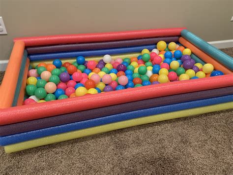 DIY pool noodle ball pit (With images) | Ball pit, Kids ball pit, Baby playroom