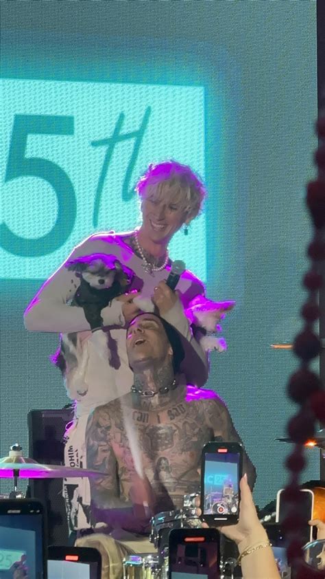 I don’t think there’s anything better than MGK putting puppies on Travis Barker’s head while ...