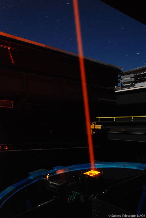 The laser beam coming out of the top part of the Subaru Telescope | Subaru Gallery | Subaru ...