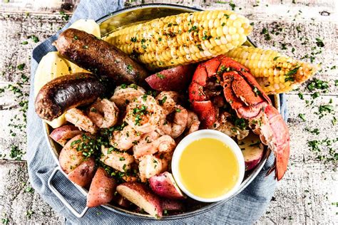 Backyard Seafood Boil with lobster, shrimp, and spicy sausage | Recipe ...