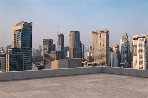 Premium Photo | Panoramic Bangkok skyline view concrete observatory deck on rooftop sunset ...