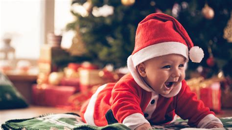 Cute Baby is Wearing Santa Outfit Lying Down On Mat In A Blur Background 4K HD Cute Wallpapers ...