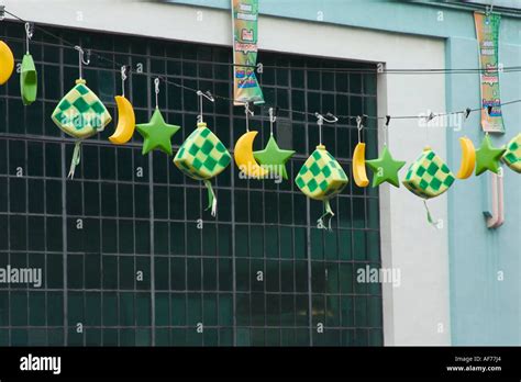 decorations hanging in mid air to celebrate hari raya festival or eid in malaysia Stock Photo ...