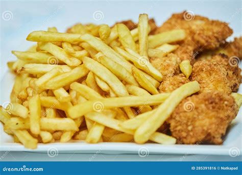 French Fries and Nuggets in a Plate Stock Photo - Image of horizontal, american: 285391816