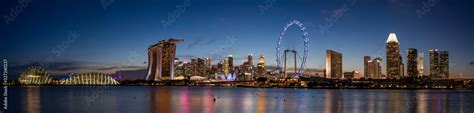 Wide panorama image of Singapore skyline at dusk Stock Photo | Adobe Stock