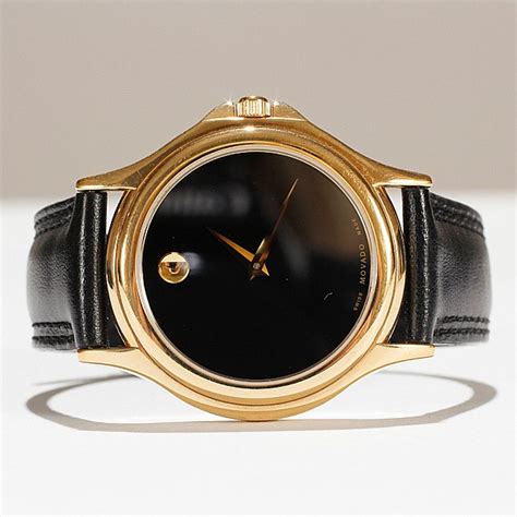 Lot - Movado ladies watch with leather band.