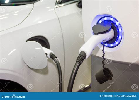 Charging an Electric Car Battery Stock Photo - Image of automotive ...