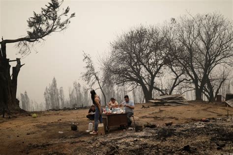 At least 24 dead in Chile as wildfires spread, driving many to flee for safety