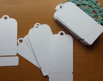 Popular items for perforated tags on Etsy