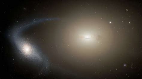 Dwarf galaxies stripped of stars prove to be the missing link in the ...