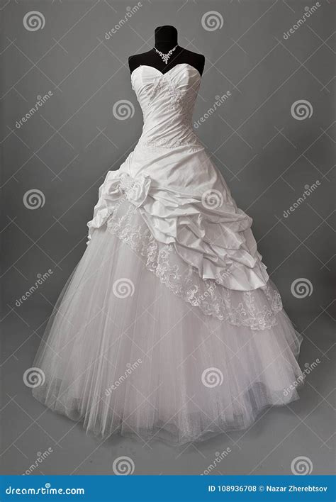 White Wedding Dress on a Mannequin Stock Photo - Image of beauty ...