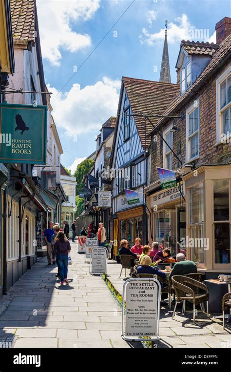 Cafe and old street scene in Frome town, Somerset UK Stock Photo - Alamy