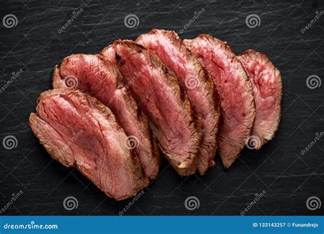 Medium Rare Venison Steak on Rustic Dark Stone Board Stock Image - Image of black, dish: 133143257