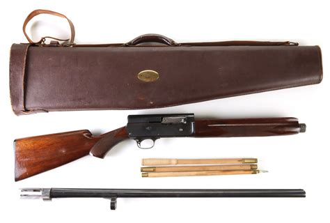 #21: A REMINGTON MODEL 11 AUTOMATIC 20 GAUGE SHOTGUN