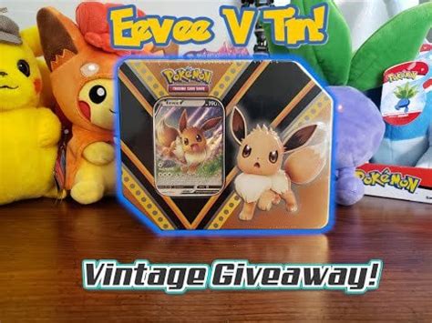 Let's look at the new Eevee V tin + continuing the VINTAGE giveaway ...