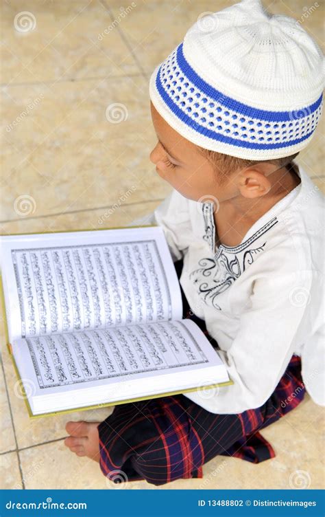 Child Reading Koran, Indonesia Stock Photo - Image of intense, koran: 13488802